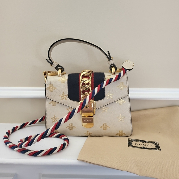 Gucci Handbags - GUCCI Textured Calfskin Bee Star Print Mini Sylvie Bag Mystic White w / COA..